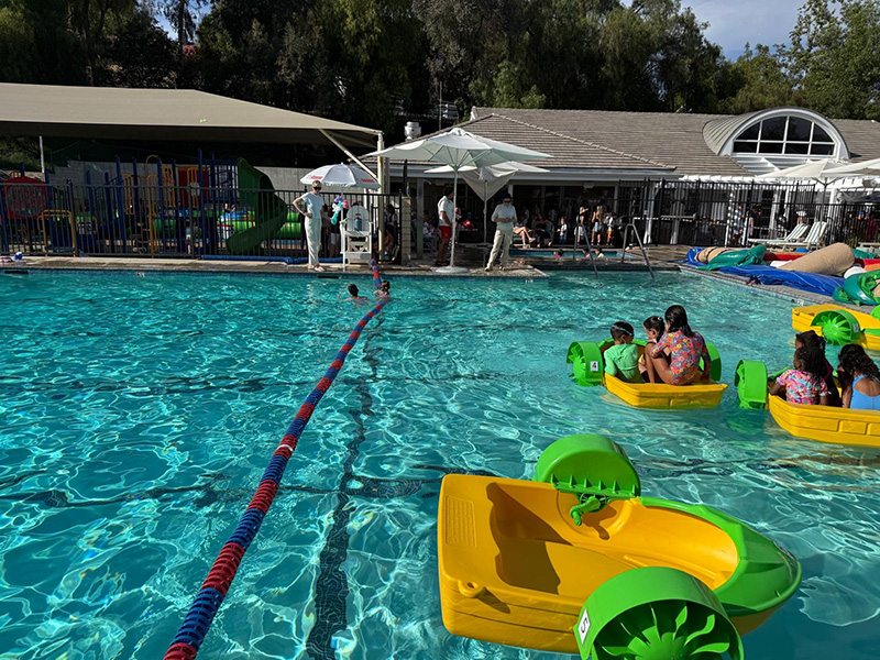 Luxury pool party with professional safety management